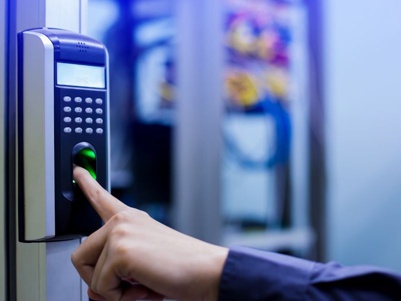 Biometric time clock system for employee time tracking