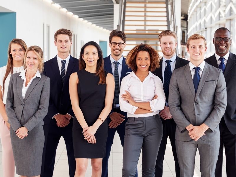 Business team standing together for corporate photo