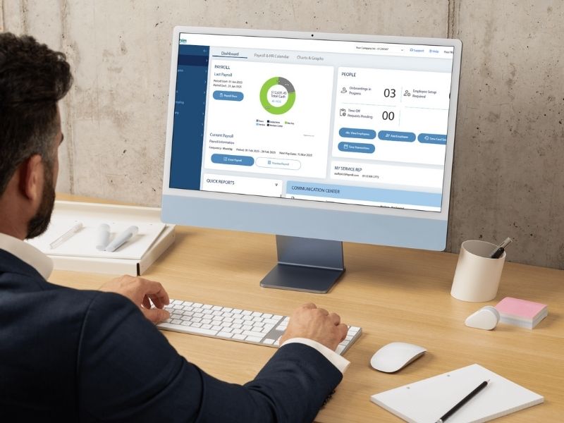 Payroll reporting dashboard on computer screen