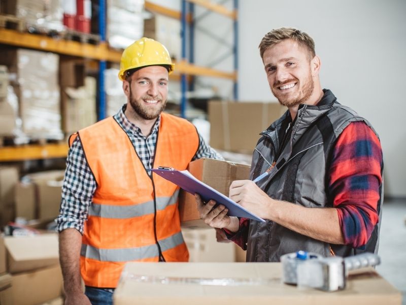 Warehouse supervisor training new employee