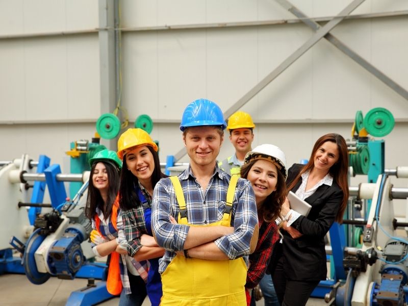 Workshop mechanics working on vehicle maintenance