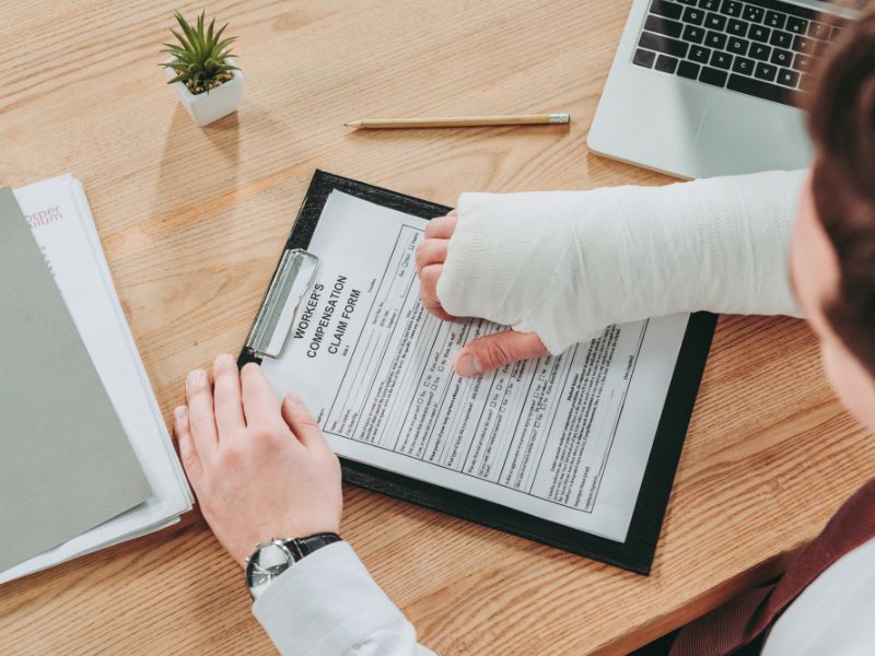 Business owner reviewing workers’ compensation insurance documents in Florida