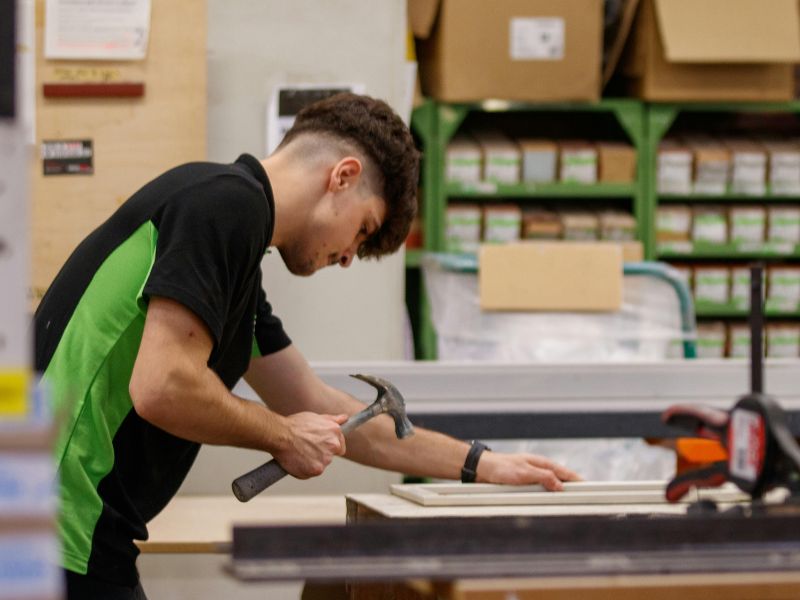 Business professional organizing inventory in a property insured for physical assets