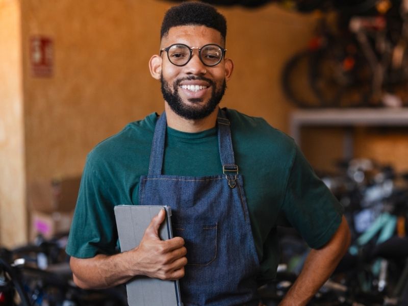 Small business professional confident knowing extended liability coverage is in place