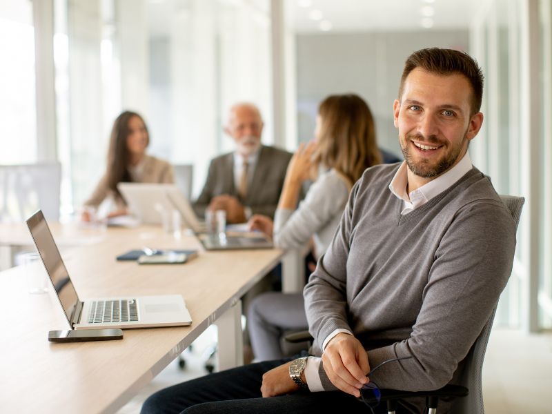 Confident business professional planning retirement benefits with his team, supported by ClearPalm’s 401(k) and retirement solutions in Florida. Confident business professional planning retirement benefits with his team, supported by ClearPalm's 401(k) and retirement solutions in Florida.